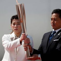 الشعلة الأولمبية تصل اليابان وسط مخاوف من فيروس كورونا